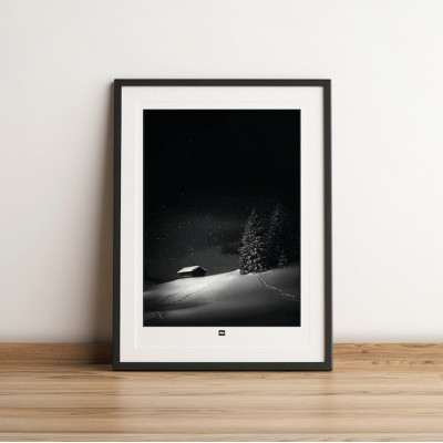 Black and white poster, photograph of an isolated cabin in the mountains, between fir trees and snow, for modern decoration. Black and white poster, photograph of an isolated cabin in the mountains, between fir trees and snow, for modern decoration.