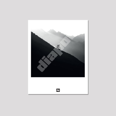 Black and white photo of a downhill bike ride in the mountains. Postcard, modern design mountain souvenir. Black and white photo of a downhill bike ride in the mountains. Postcard, modern design mountain souvenir.