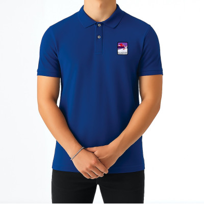 Blue Blackpeuf polo in organic cotton – mountain fashion with iconic illustrated patch