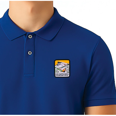 Blue Blackpeuf polo in organic cotton – mountain fashion with iconic illustrated patch