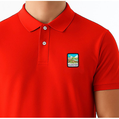 Red Blackpeuf polo in organic cotton with mountain patch – designer clothing inspired by Savoie