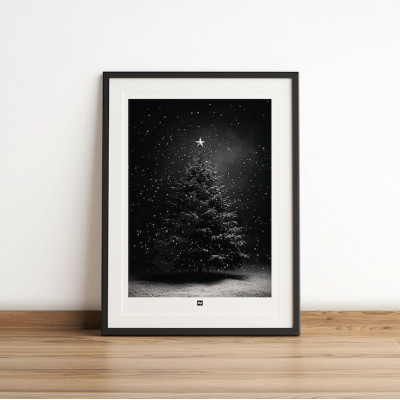 Black and white photo of a Christmas tree with snowflakes. Modern, designer winter wall hanging.