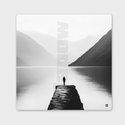 Black and white photograph of a pontoon by a lake between mountains. Designer wall art for modern décor. Black and white photograph of a pontoon by a lake between mountains. Designer wall art for modern décor.