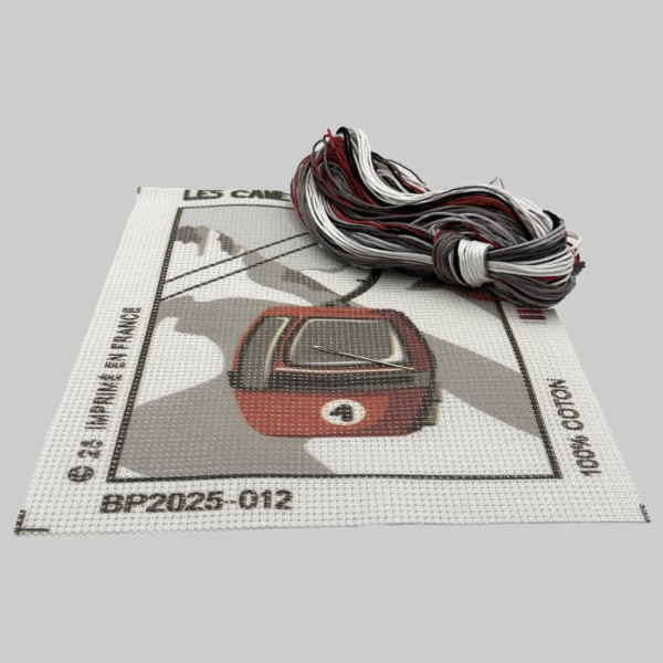 Stickvorlage-Set „Berg Blackpeuf“ – rotes Ei hängt im Schnee in Rot- und Grautönen.